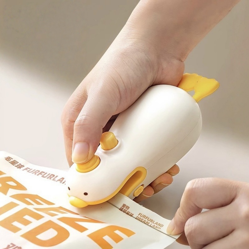 เครื่องซีลถุงแบบพกพา รูปเป็ดน่ - Snacks Food Usa บทวิจารณ์และราคา
